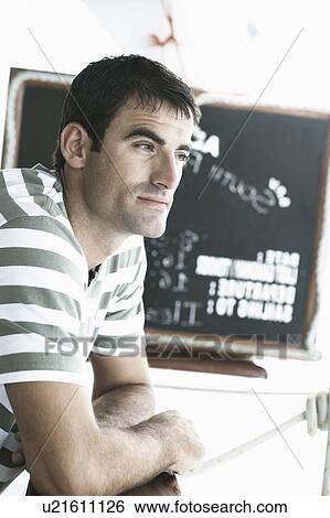 Side profile of a mid adult man thinking View Large Photo Image Stock Photograph - Side profile of a mid adult man thinking. Fotosearch