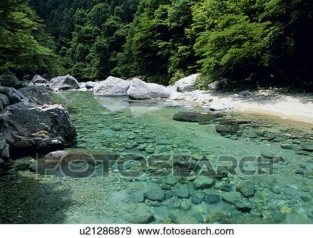 "River in valley, Nagano, Japan" View Large Photo Image Stock Photo - "River in valley, Nagano, Japan". Fotosearch