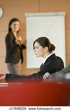 Professional woman giving a presentation View Large Photo Image Stock Photography - Professional woman giving a presentation. Fotosearch