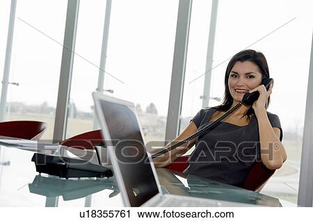 Professional woman on telephone View Large Photo Image Stock Image - Professional woman on telephone. Fotosearch