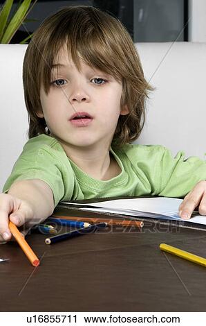Boy drawing View Large Photo Image Stock Image - Boy drawing. Fotosearch
