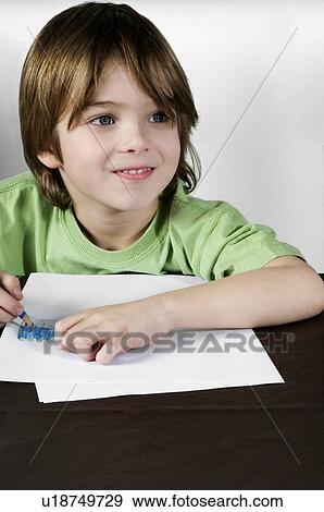 Boy drawing View Large Photo Image Stock Photo - Boy drawing. Fotosearch