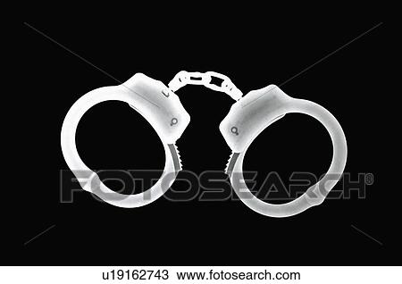 Stock Image - X-ray Image, Handcuffs. Fotosearch