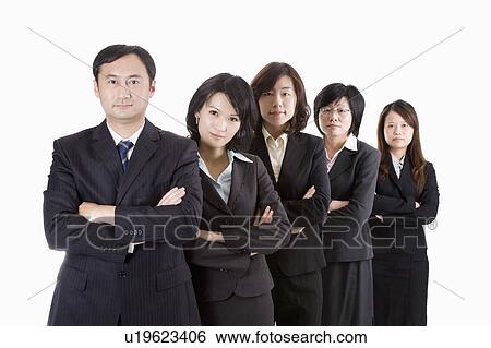 Business people standing in a row with arms crossed on chest View Large Photo Image Stock Photograph - Business people standing in a row with arms crossed on chest. Fotosearch