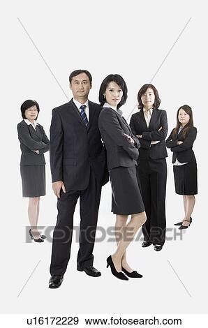 Business people standing together with hands on chest, Business People View Large Photo Image Stock Photo - Business people standing together with hands on chest, Business People. Fotosearch