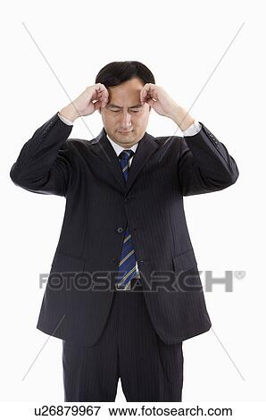 Businessman standing with hands on head and looking down, Business People View Large Photo Image Stock Photo - Businessman standing with hands on head and looking down, Business People. Fotosearch