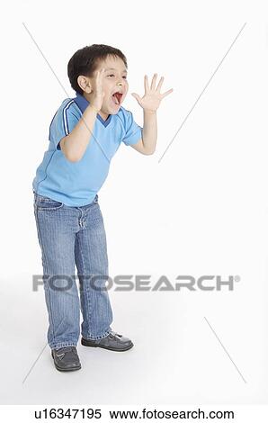 Stock Photography - Boy standing and shouting, Child. Fotosearch