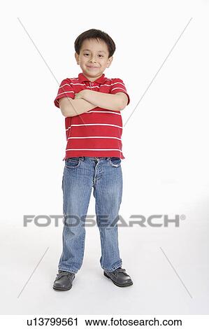 Boy standing with hands on chest and smiling at the camera, Child View Large Photo Image Stock Image - Boy standing with hands on chest and smiling at the camera, Child. Fotosearch
