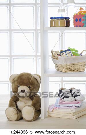Baby products and a teddy bear View Large Photo Image Stock Photography - Baby products and a teddy bear. Fotosearch