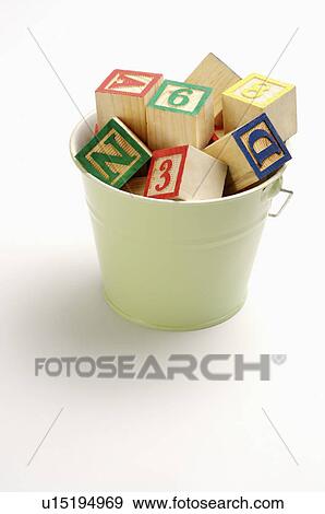 Blocks in a bucket View Large Photo Image Stock Photo - Blocks in a bucket. Fotosearch