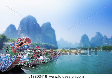 Dragon boats with beautiful scenery of Dragon Boat Festival, CG, Chinese Culture, Backgrounds View Large Photo Image Stock Photograph - Dragon boats with beautiful scenery of Dragon Boat Festival, CG, Chinese Culture, Backgrounds. Fotosearch