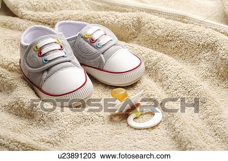 Stock Image - Pacifier, Shoes. Fotosearch