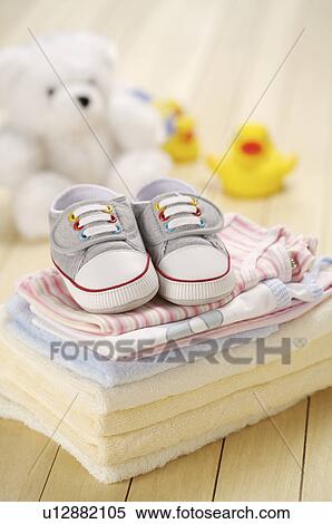 Shoes on towels View Large Photo Image Stock Photography - Shoes on towels. Fotosearch