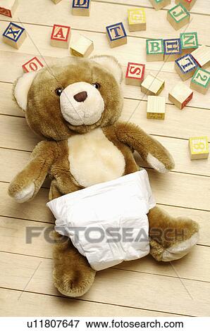 Teddy Bear in diaper View Large Photo Image Stock Photo - Teddy Bear in diaper. Fotosearch