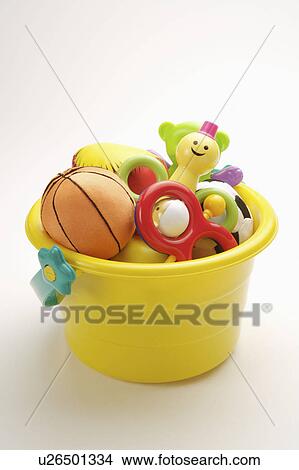 Toys in bucket View Large Photo Image Picture - Toys in bucket. Fotosearch