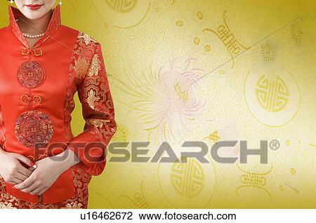 Young woman wearing cheongsam for wedding, CG, Chinese Culture, Backgrounds View Large Photo Image Stock Image - Young woman wearing cheongsam for wedding, CG, Chinese Culture, Backgrounds. Fotosearch