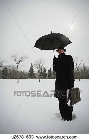 A businessman out in the cold View Large Photo Image Stock Image - A businessman out in the cold. Fotosearch