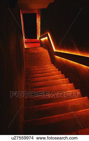 A dimly lit staircase View Large Photo Image Picture - A dimly lit staircase. Fotosearch