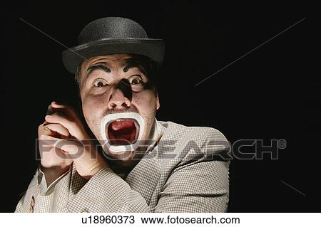 Stock Image - A frightened man. Fotosearch