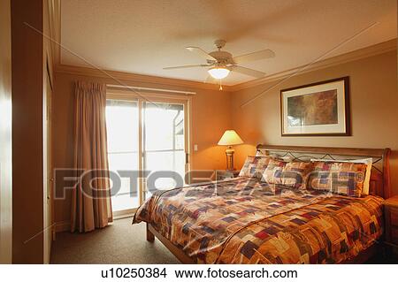 A king size bed View Large Photo Image Picture - A king size bed. Fotosearch