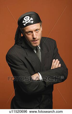 A man playing the part of a pirate View Large Photo Image Stock Photograph - A man playing the part of a pirate. Fotosearch