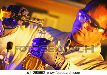 Stock Image - A scientist in a lab. Fotosearch