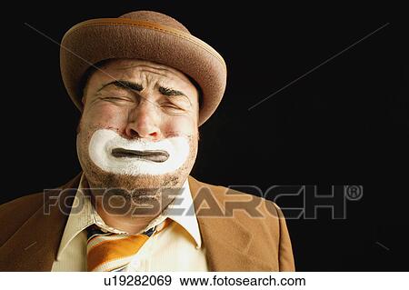 Stock Photo - A sorrowful expression. Fotosearch