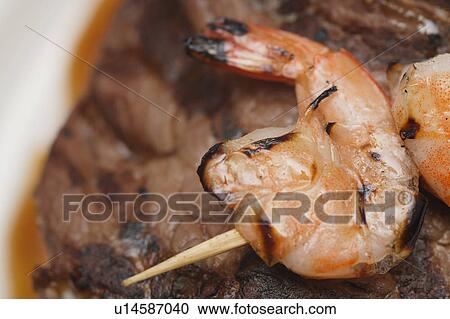 Barbecued shrimps and steak View Large Photo Image Stock Image - Barbecued shrimps and steak. Fotosearch