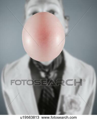 Blowing a bubble in a suit View Large Photo Image Stock Image - Blowing a bubble in a suit. Fotosearch