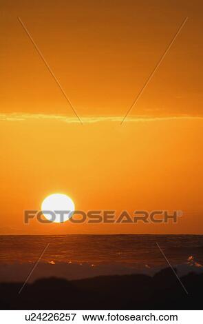 Stock Photo - Breathtaking sunset. Fotosearch