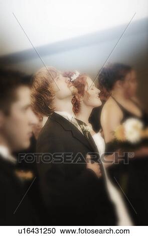 Bride and groom in church View Large Photo Image Stock Image - Bride and groom in church. Fotosearch