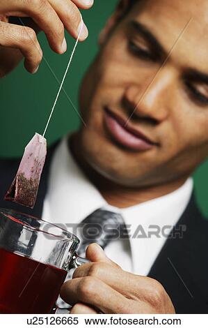 Businessman having tea View Large Photo Image Stock Photography - Businessman having tea. Fotosearch