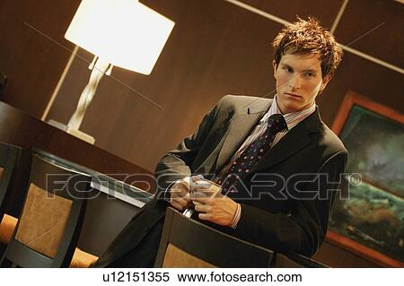 Stock Photography - Businessman with cup of coffee. Fotosearch