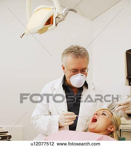 Stock Image - Check up at the dentist's. Fotosearch
