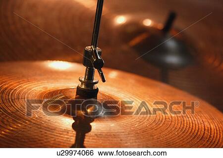 Stock Photograph - close-up of brass cymbal. Fotosearch