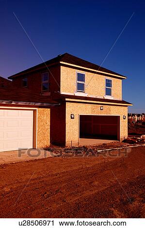 Stock Image - Construction of a house. Fotosearch