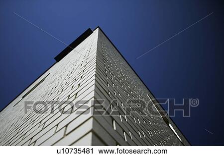 Stock Image - Corner of a tall building. Fotosearch