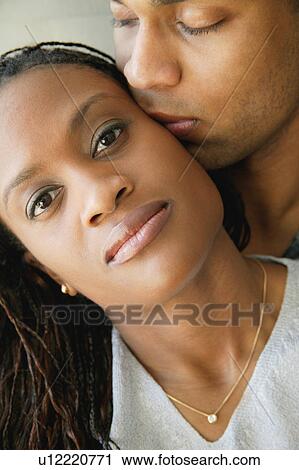 Stock Image - Couple kiss. Fotosearch