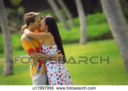 Couple kissing View Large Photo Image Stock Photograph - Couple kissing. Fotosearch