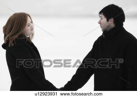 Couple standing outside View Large Photo Image Stock Image - Couple standing outside. Fotosearch