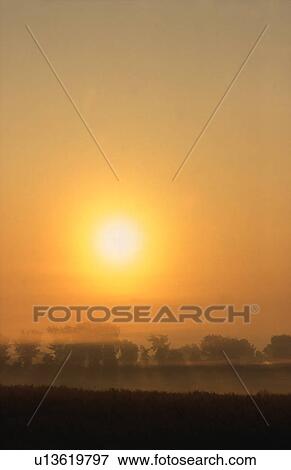 Stock Photo - Early golden morning. Fotosearch