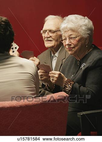 Picture - Family card night. Fotosearch