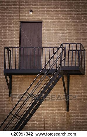 Stock Image - Fire escape at the back of a building. Fotosearch