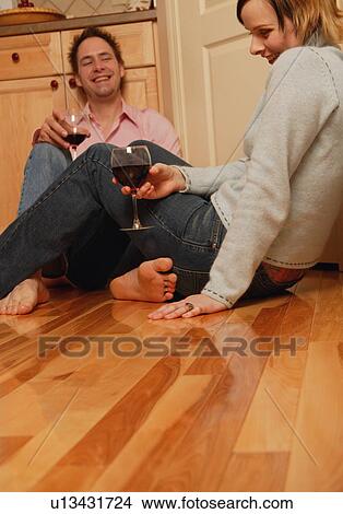 Picture - Footsy on the floor. Fotosearch
