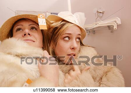 Fur coats in a thrift store View Large Photo Image Stock Photo - Fur coats in a thrift store. Fotosearch