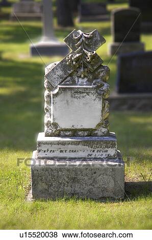 Headstone in graveyard View Large Photo Image Stock Photo - Headstone in graveyard. Fotosearch