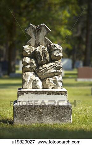 Headstone in graveyard View Large Photo Image Stock Photo - Headstone in graveyard. Fotosearch