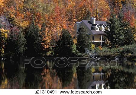 House on lake in the fall View Large Photo Image Stock Image - House on lake in the fall. Fotosearch
