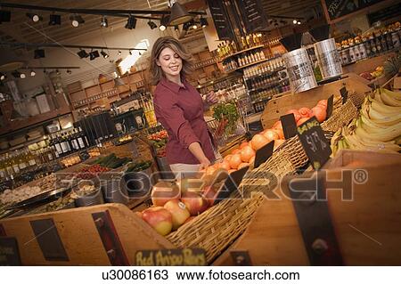 Stock Image - In a grocery store. Fotosearch