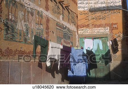 Stock Image - Laundry hung on outside line. Fotosearch